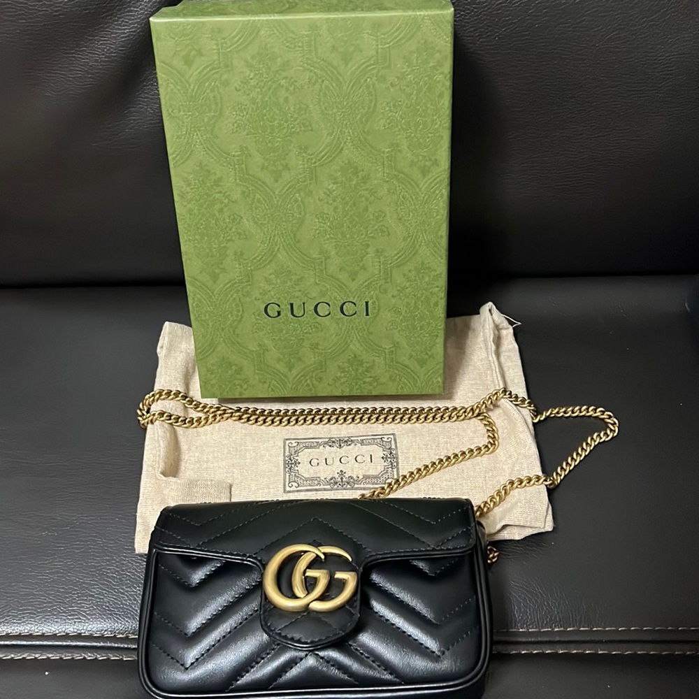 SOLD OUT. Authentic brand new Gucci GG Marmont super mini bag in black